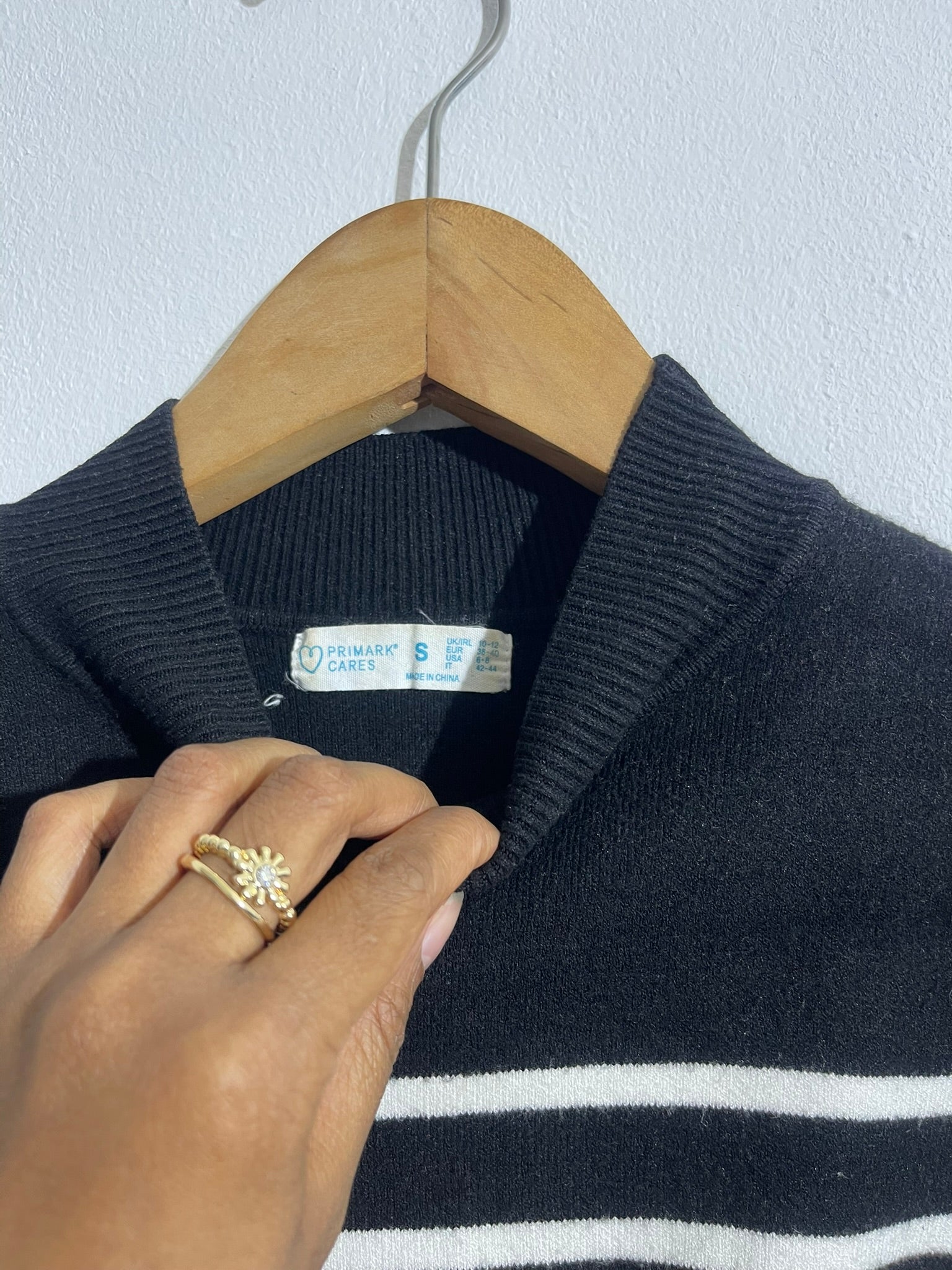 Pull rayé noir et blanc col montant