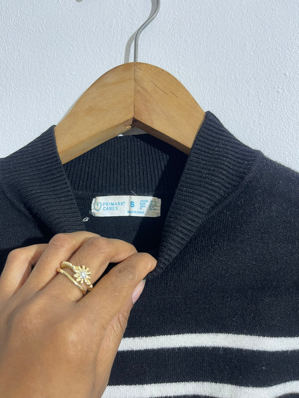 Pull rayé noir et blanc col montant